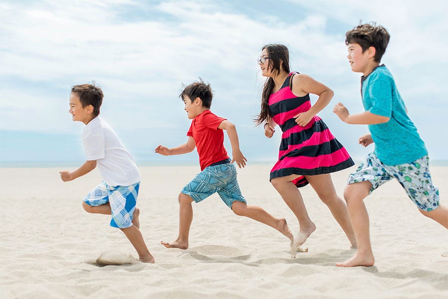 Kids Running on Oxnard Beach