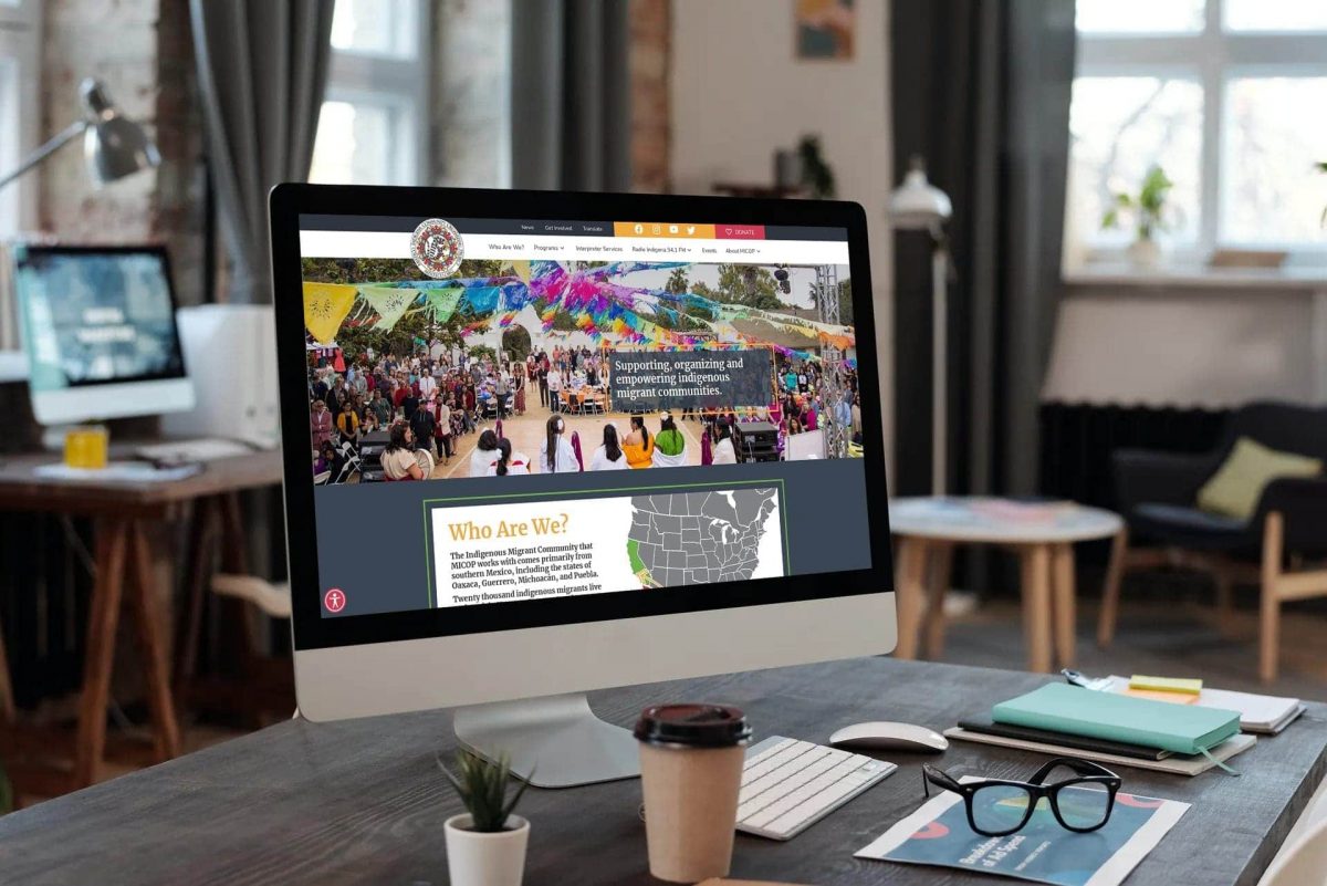 The Mixteco website is displayed on an iMac in a home setting