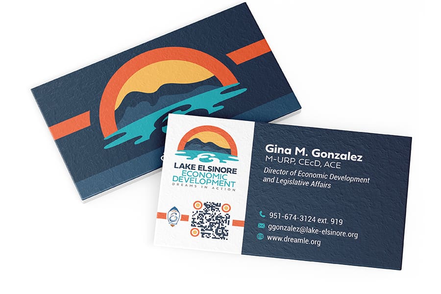 LEED_Portfolio_03 Business cards for the Lake Elsinore Economic Development team seamlessly blend branding with function, showcasing a sun and mountains logo. Contact details for Gina M. Gonzalez, Director of Economic Development, are included.